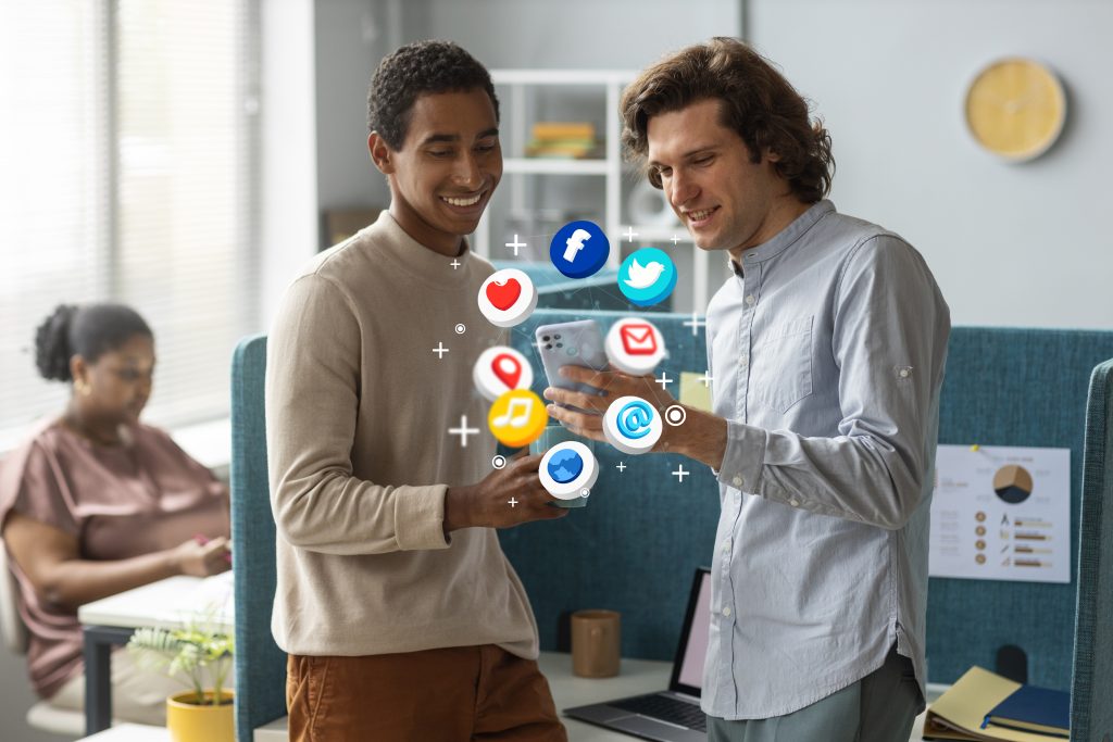 Two men exploring different digital platforms